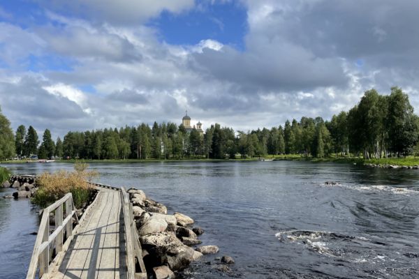 Kuhmo church seen from the Pajakkajoki rapids